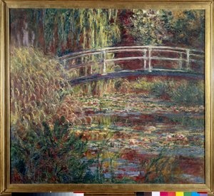 Le bassin aux nympheas, harmonie rose door Claude Monet