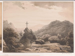 Berglandschap met kruis op een rots