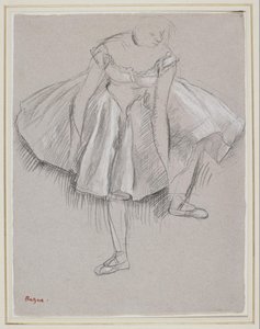 Danseres die haar Slof Aanpast