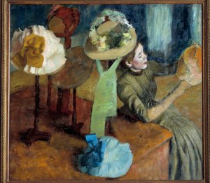Bij de modiste (of De hoedenwinkel) door Edgar Degas