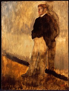 Portret van een man die met zijn handen in zijn zakken staat