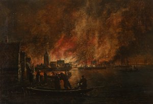 Nachtelijk vuur boven Nederlandse stad