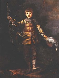 Portret van een jonge jongen die danst in een bos