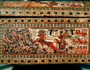 Egyptische oudheid: kleine houten doos met scènes die farao Toetanchamon uitbeelden die Nubiërs achtervolgt op zijn wagen. 18e dynastie. Uit het graf van Toetanchamon (1345-1327 v.Chr.) Vallei der Koningen. Thebe. Zon. 61 cm Caïro, Egyptisch Museum