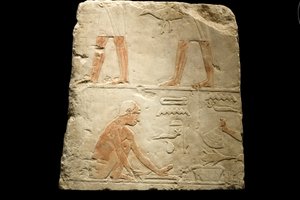 Fragment van een reliëf dat voedselbereiding uitbeeldt (kalksteen)