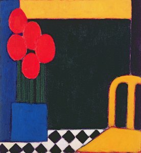 Tulpen en gele stoel