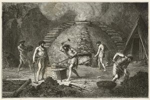 De primitieve oven voor ijzerwinning door Emile Antoine Bayard