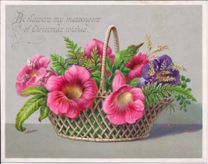 Een Victoriaanse kerstkaart van bloemen in een rieten mand, ca. 1880