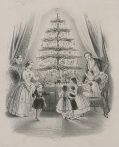 Een familie rond een kerstboom