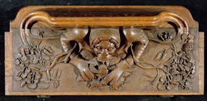 Een misericord die een ogre met enorme schouders toont, New College Chapel, Oxford, laat 14e eeuw (hout)