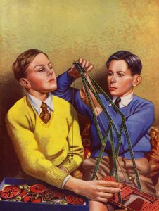 Jongens bouwen met een speelgoedconstructieset door English School
