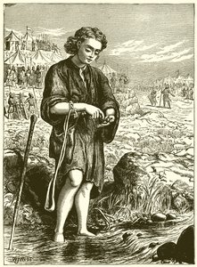 Kiezen van gladde stenen uit de beek