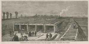 Aanleg van de betonnen dijk over de Plaistow moerassen