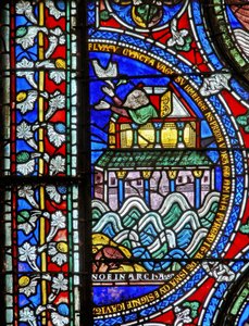 Detail van een van de Bijbelramen met Noach die de duif bij de ark verwelkomt