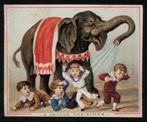 Olifant die speels kinderen besproeit met water, kerstkaart