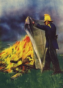 Brandweerman experimenteert met een asbest branddeken door English School