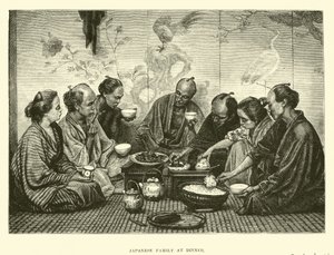 Japanse familie aan het diner