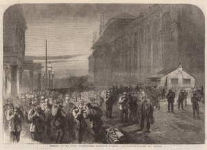 Voortgang van het Internationale Tentoonstellingsgebouw: De arbeiders verlaten het terrein door English School