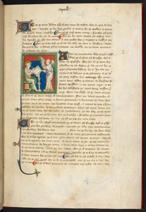 Johannes zittend, schrijvend; een engel staat achter zijn bureau, uit 