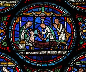 Een scène uit een St. Thomas Becket wonderraam: Cicely van Plumstead(?) zit rechtop op haar lijkbaar