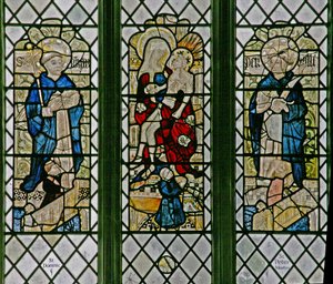 Raam w4 met de Pieta met St. Dominicus en St. Petrus Martelaar: kleine schenkerfiguren door English School