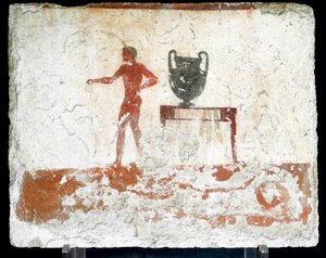 Etruskische kunst: een jonge naakte ephebe bij een tafel waar een vaas op staat. Fresco van het graf van de 