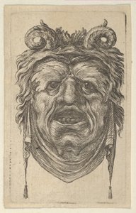 Satermasker met gekrulde hoorns, bladerige wenkbrauwen en een doek onder de kin.