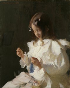 Portret van een naaiend kind