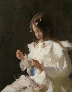 Portret van een kind dat naait