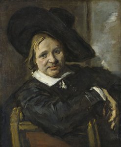 Portret van een zittende man met een zachte hoed door Frans Hals