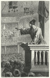 Een imam leest uit de Koran