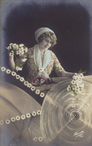 Een jonge vrouw met veel bloemen die in een fabriek werkt door French Photographer