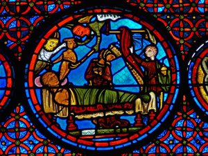 Detail uit een raam van de gelijkenis van Lazarus en de Rijke Man