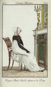 Modieuze vrouw zittend voor een open haard