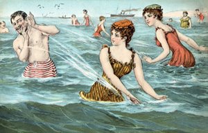 Meisjes spetteren een man in de zee nat door French School