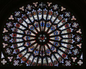 Roosvenster met Christus omringd door de twaalf apostelen en evangelistensymbolen door French School