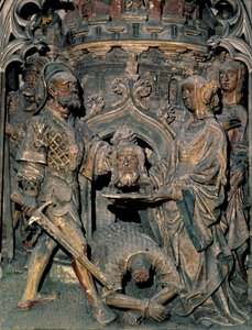 De dood van Johannes de Doper. Het hoofd van Johannes de Doper wordt op een schaal gelegd die Salome aan haar moeder presenteert. Gesneden reliëf van de Kathedraal Notre-Dame d