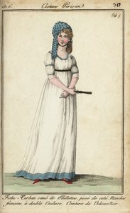 Vrouw in een hoofddoek-tulband en tuniekjurk
