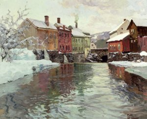 Met sneeuw bedekte gebouwen bij een rivier