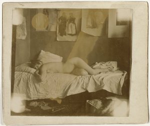 Marie Jordan naakt liggend op een bed door George Hendrik Breitner