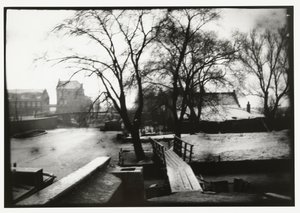 Wintergezicht over de Amstel in Amsterdam door George Hendrik Breitner