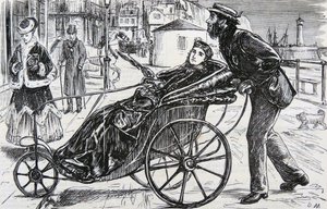 Patrick, die de badstoel van de dame duwt