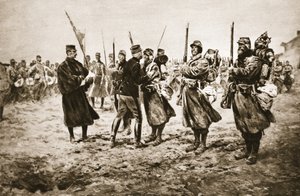 Eerbetoon aan de dapperen in de vuurlinie: een Franse generaal geeft de onderscheiding aan mannen die zijn gedecoreerd met de militaire medaille, uit 