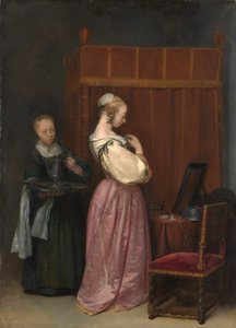 Jonge vrouw heeft haar toilet door Gerard Terborch