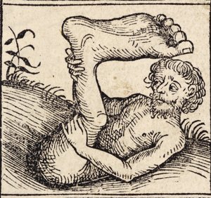 Een sciopod, Man met een gezwollen voet, uit `Registrum Hujus Operis Libri Cronicarum cum Figuris et Imagibus ab Inicio Mundi