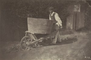 Mannelijke boer met kruiwagen door Giraudon