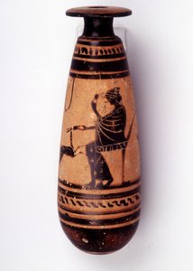 Schilderij op vaas: albasten gebruikt om het parfum te bevatten: een zijde toont een vrouw die met een hinde speelt en een bloem vasthoudt. Haar mand om de wol te houden is achter haar. 500 v.Chr. BNF, Medaille Kantoor door Greek