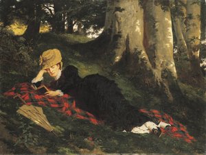 Vrouw die leest in een bos