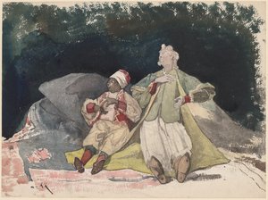 Twee poppen of marionetten zittend op kussens