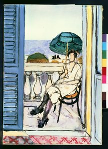 Vrouw met groene parasol op balkon